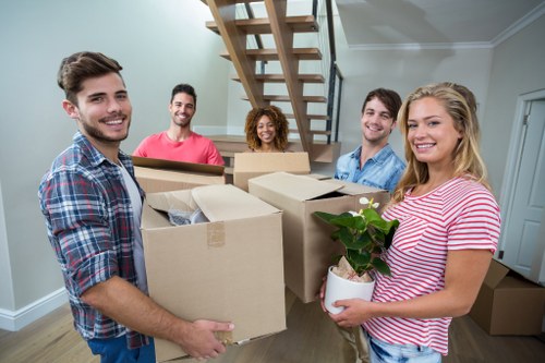 Local moving team handling a Borough home relocation on a busy street