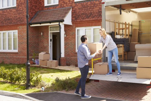 Careful loading of furniture and boxes for a student move in Borough