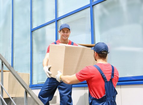 Strong cardboard boxes and packing wrap ready for local moving needs