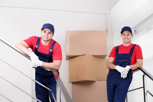 Moving van and crew managing access challenges in Borough