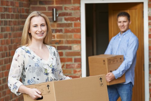 Team handling household items in central Borough