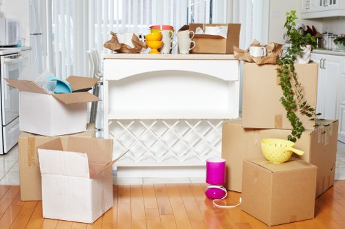 Careful loading of boxes and furniture for a Borough apartment relocation