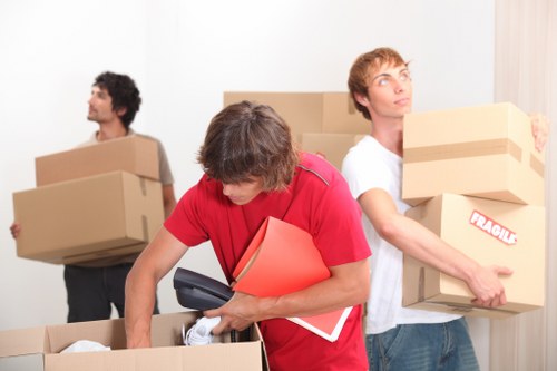 Local movers handling retail stock and fixtures during a Borough commercial move
