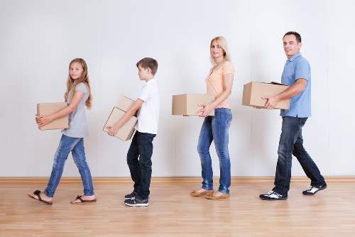 Packed boxes and furniture ready for urgent removals in Borough